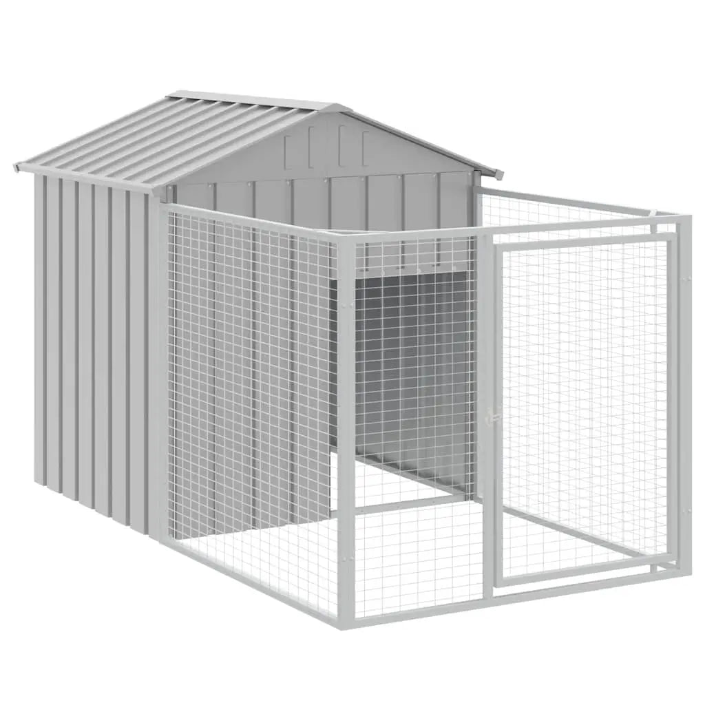 Light grey galvanised steel dog kennel with attached wire mesh run and sloped roof, on a white background
