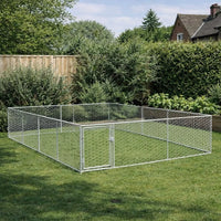 Three by four metre hexagonal mesh dog run installed on a lawn beside a wooden fence and hedge