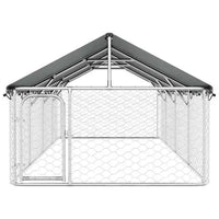 Front view of the galvanised steel dog kennel showing the pitched roof cover and hinged lockable gate