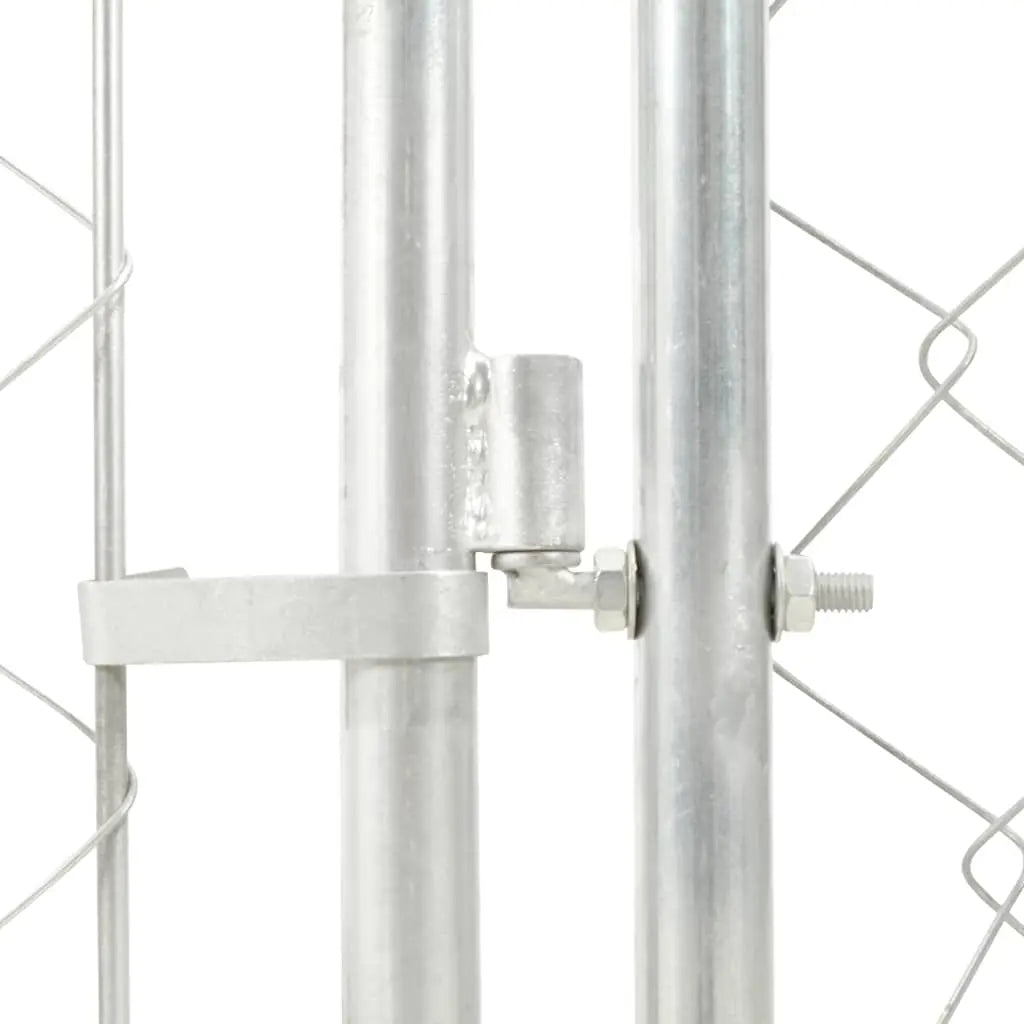 Detail of the galvanised steel frame connector joining two chain-link mesh panels on the dog kennel