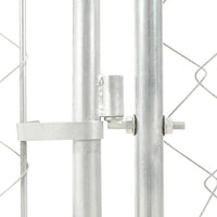 Detail of the galvanised steel frame connector joining two chain-link mesh panels on the dog kennel