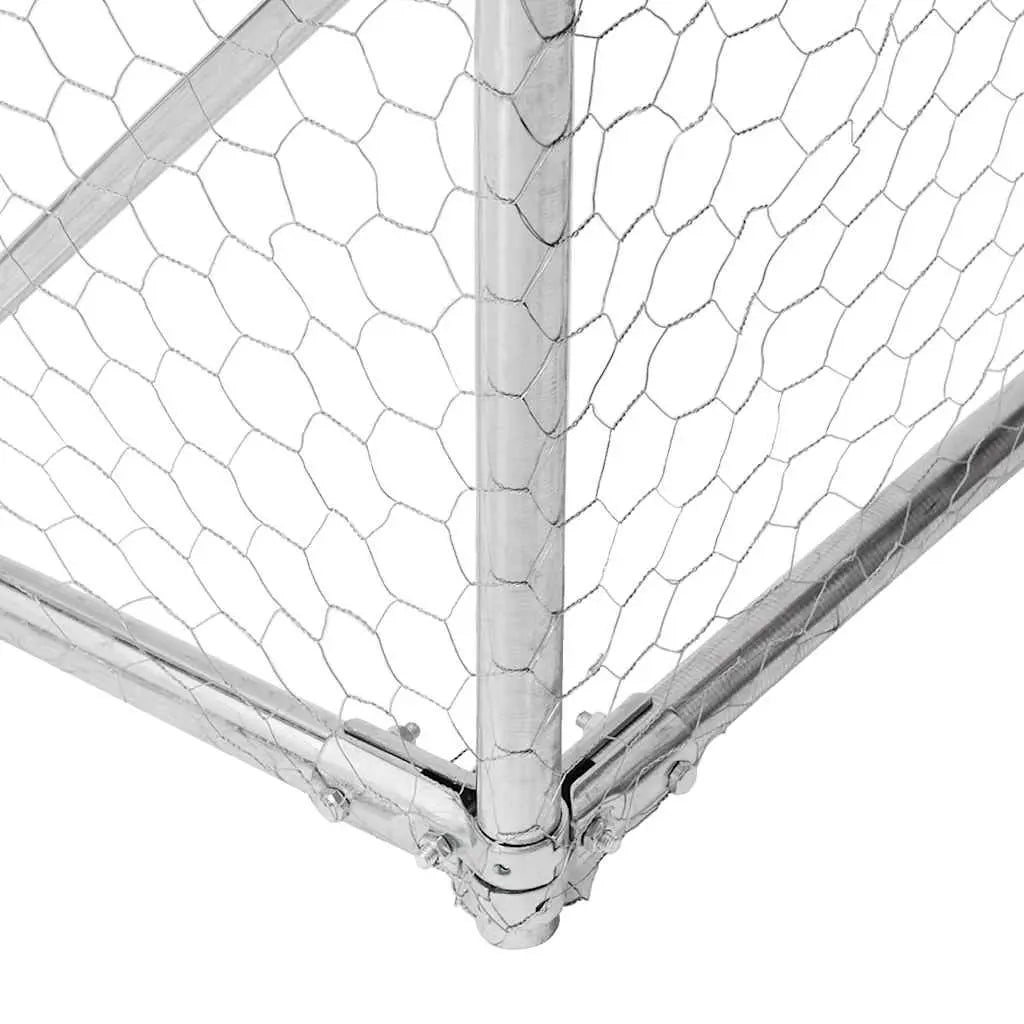 Corner detail of the galvanised steel frame joint and hexagonal wire mesh panel on the dog run