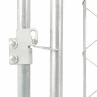 Close-up of a galvanised steel frame joint and chain-link mesh panel on the outdoor dog kennel