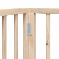 Close-up of the metal hinges joining two poplar wood panels of the foldable dog gate