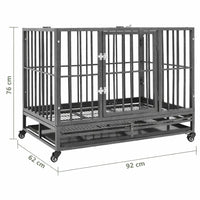 Larger size steel dog crate on wheels with overall dimensions 102 x 72 x 85 cm marked, on a white background