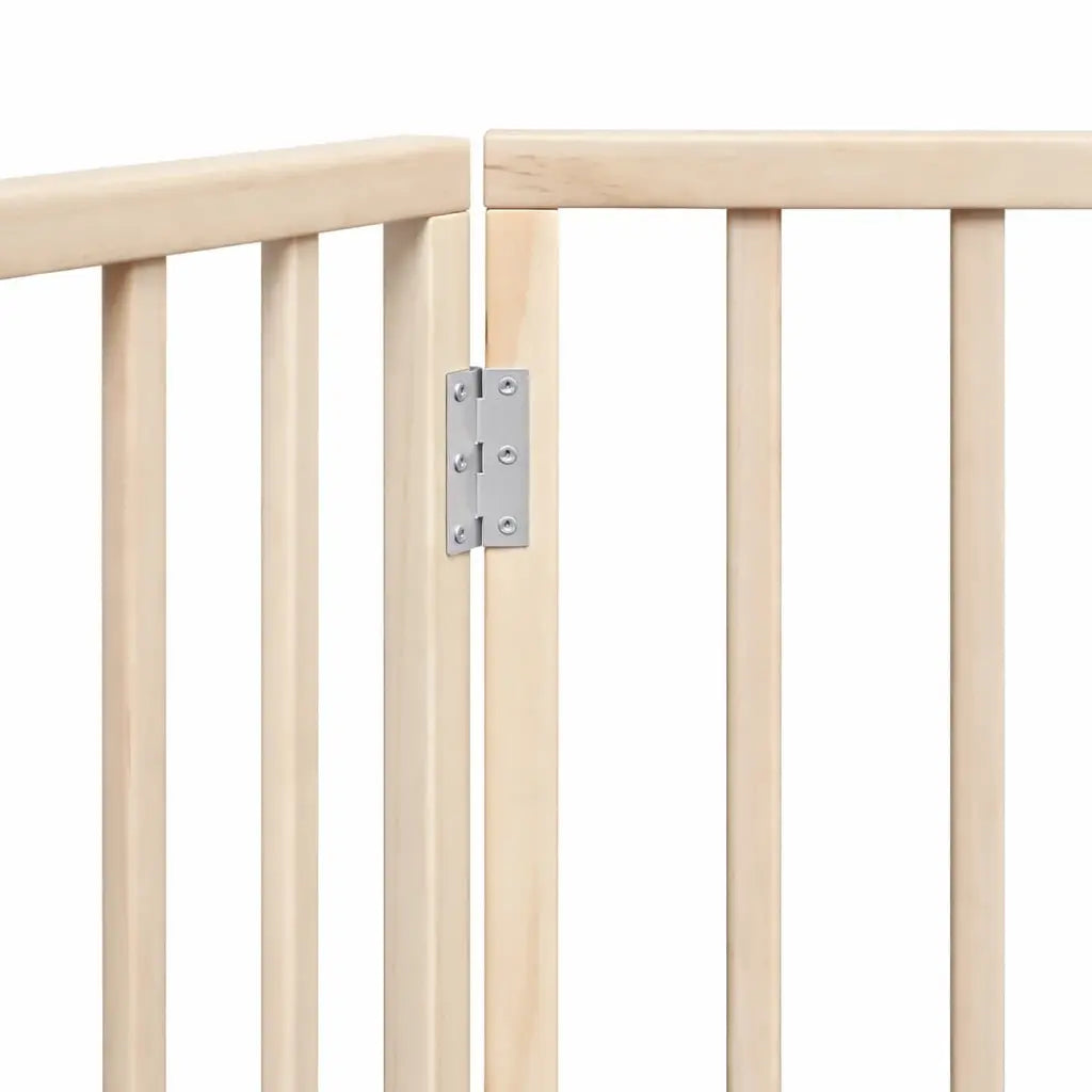 Detail of the metal hinges joining the poplar wood panels of the three-panel dog gate