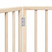 Detail of the metal hinges joining the poplar wood panels of the three-panel dog gate