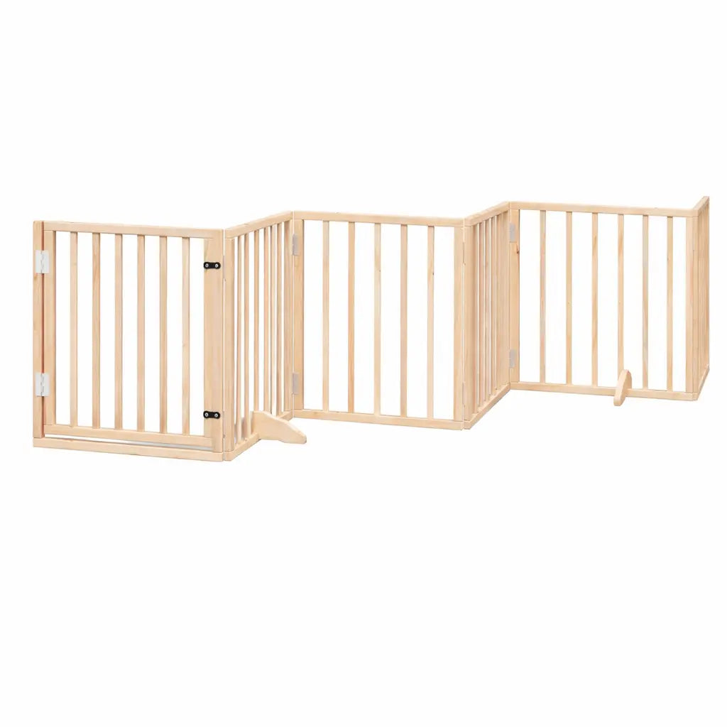 Natural wood six-panel dog gate standing across a kitchen doorway as a freestanding pet barrier