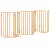 Natural finish poplar wood six-panel dog gate standing on its feet with the locking walk-through door closed