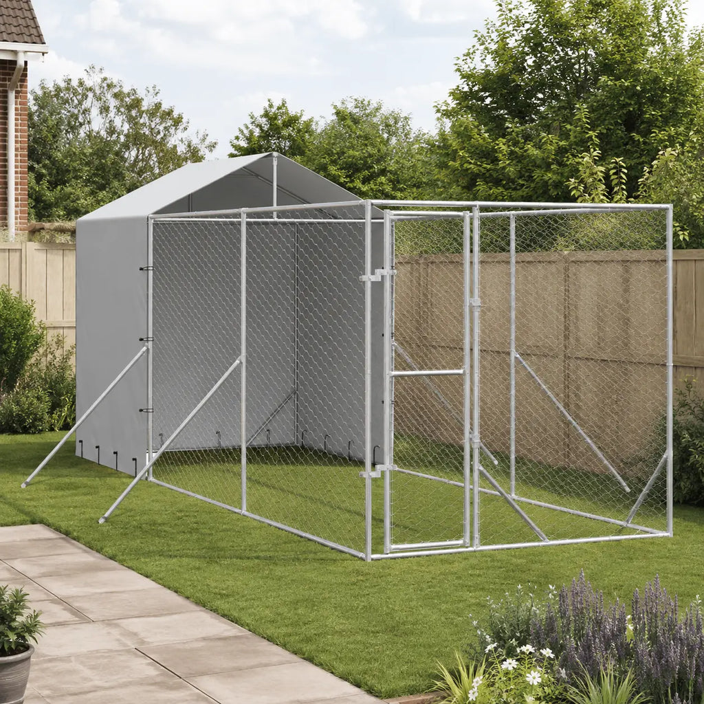 Heavy-duty outdoor dog kennel with peaked waterproof roof on garden patio, galvanized wire mesh dog enclosure
