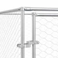 Close-up of the galvanised steel tube frame and clamp fittings on the outdoor dog run