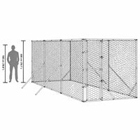Scale comparison showing the 2 m high dog run alongside an adult human silhouette